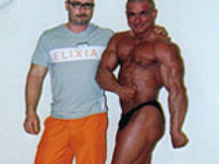 Personal Trainer für Bodybuilding mit Burklaf Scheibe